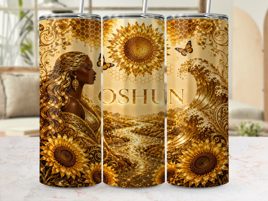 Golden tumbler with Oshun imagery, sunflowers, waves, and butterflies.
